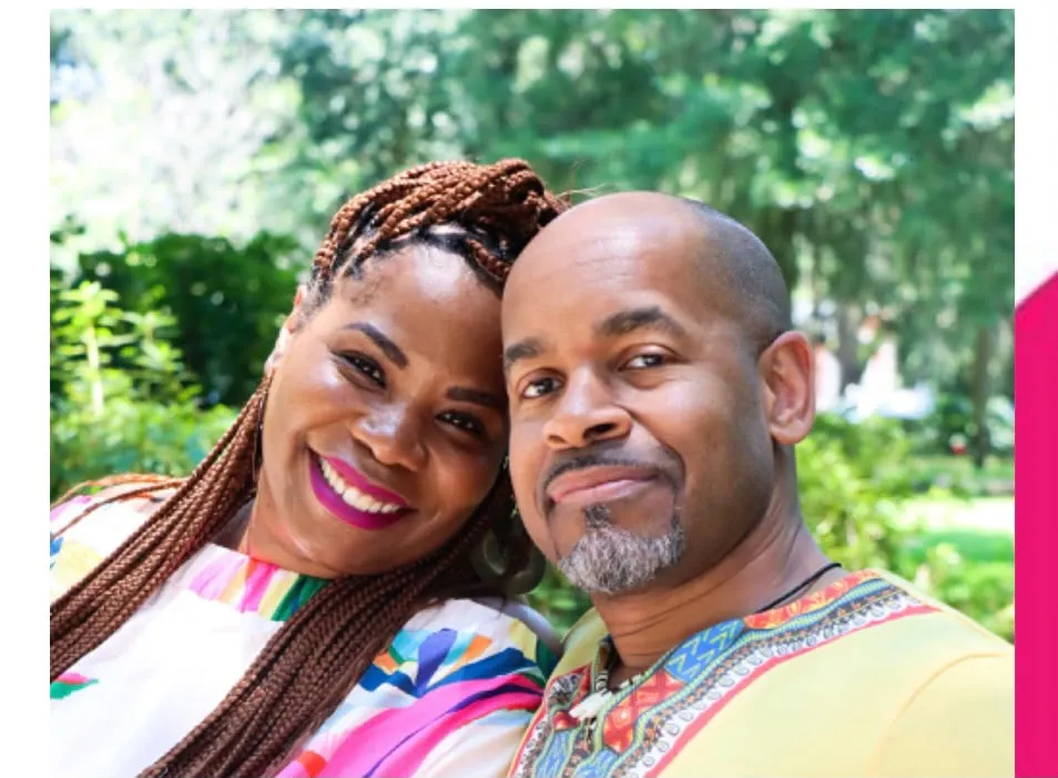 Renee and Chad Hall, Co-Founders of The Love Camp, smiling warmly together in natural golden light