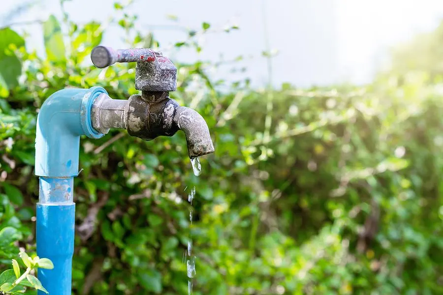HVAC technician installing new ductwork in residential system