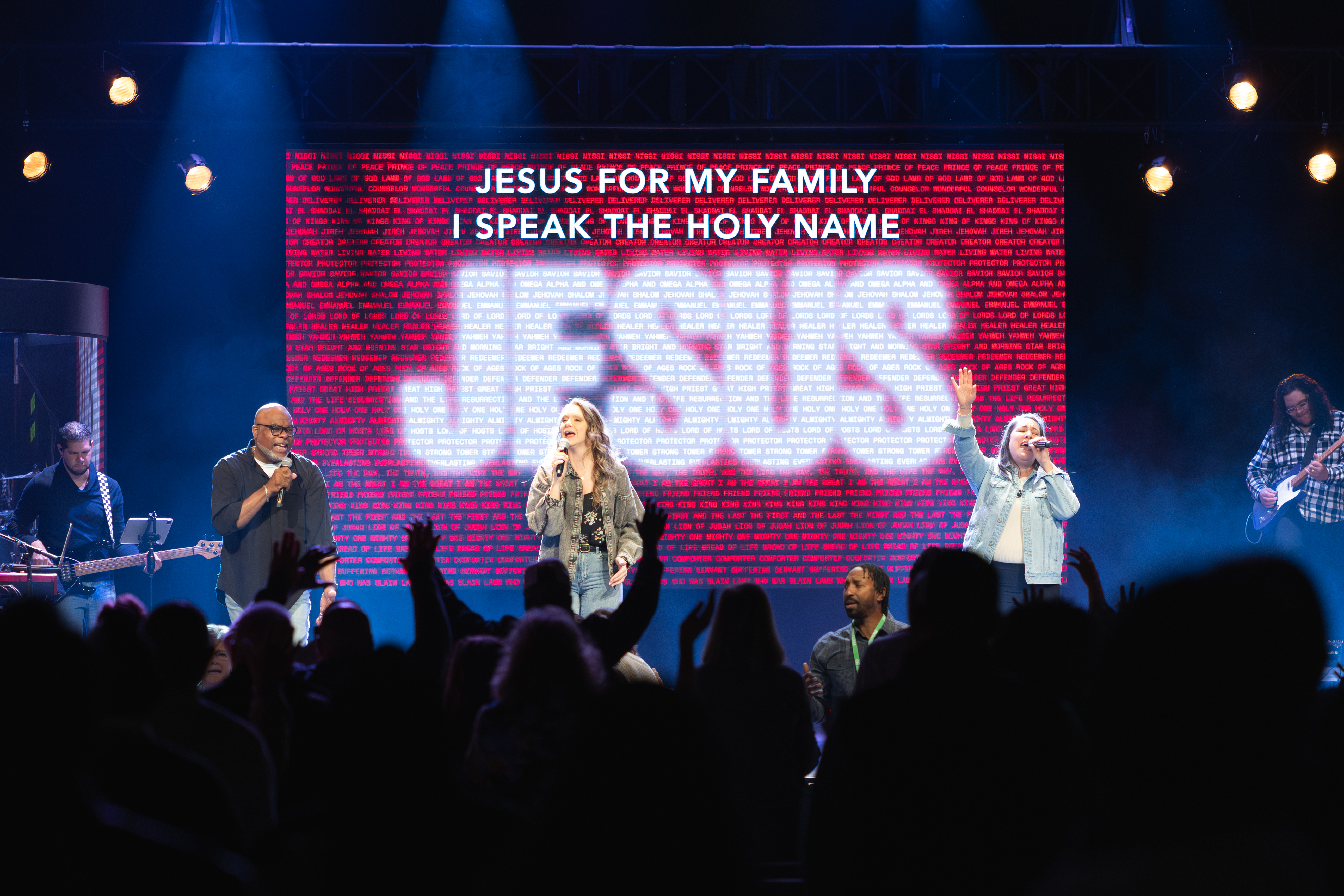 People worshiping in a modern church service