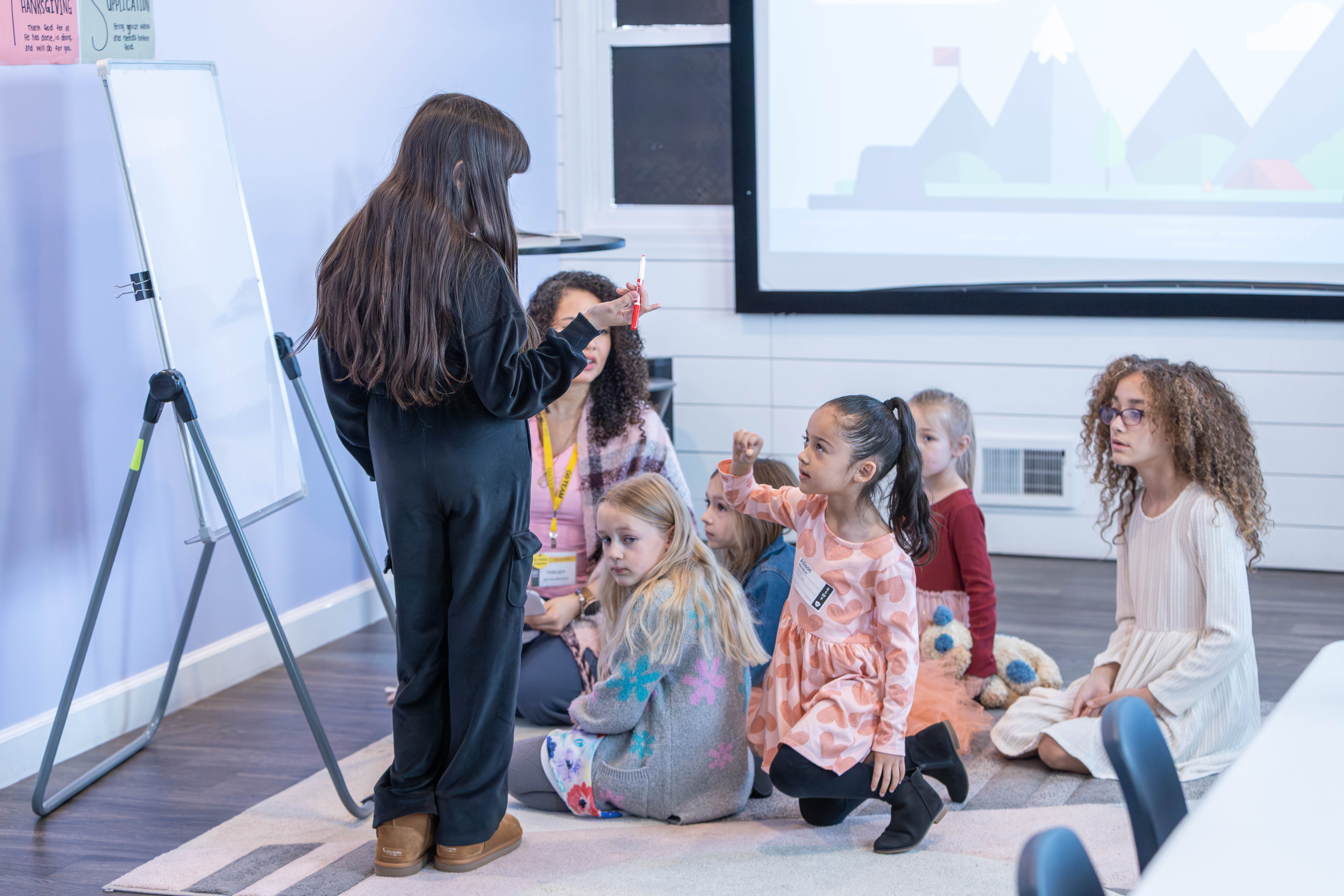 Two kids making a peace sign