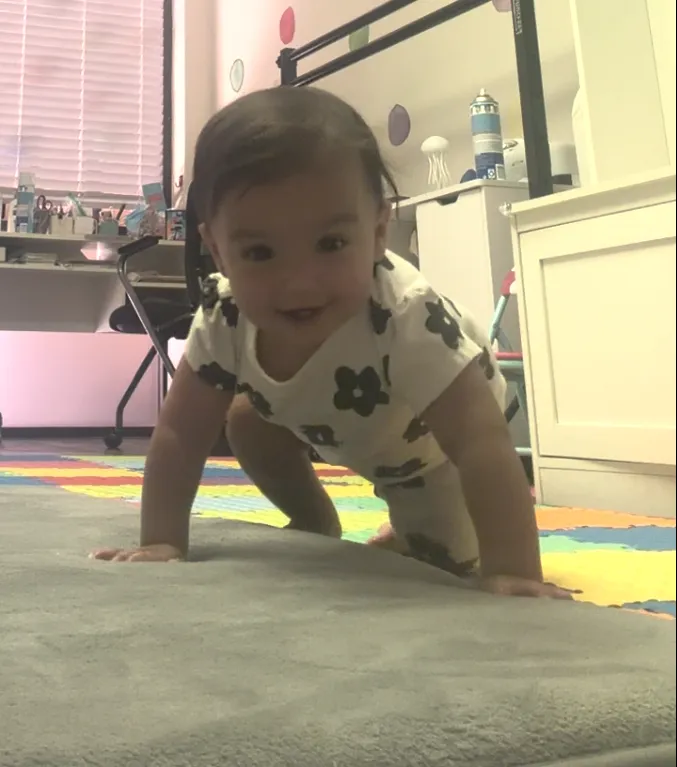 baby crawling, baby in hitch crawl, baby crawling with one leg out to the side, in pediatric physical therapy evaluation in Scottsdale, AZ