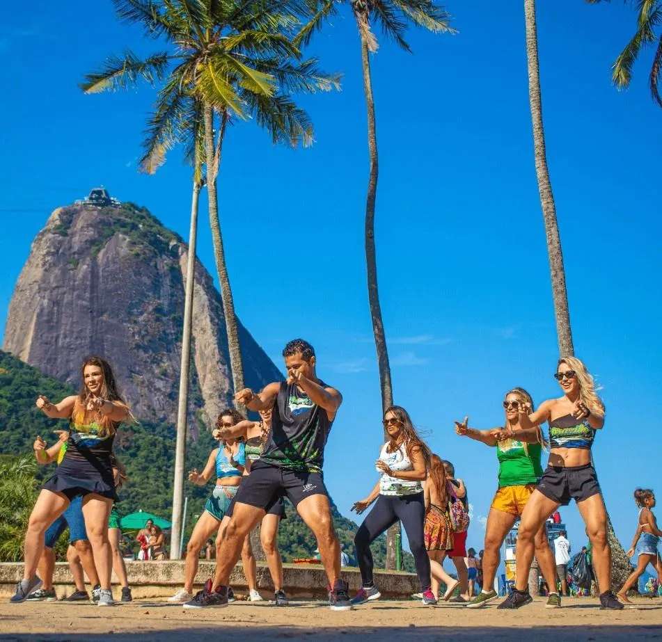 e dancing, Brazilian dance fitness class, Sugar Loaf Mountain, beach in Rio de Janeiro, Brazil