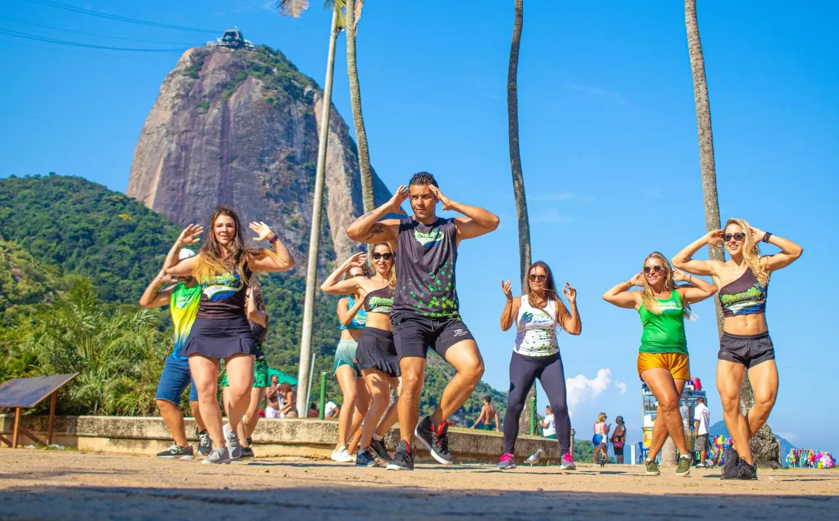 e dancing, Brazilian dance fitness class, Sugar loaf mountain, beach in Rio de Janeiro, Brazil 