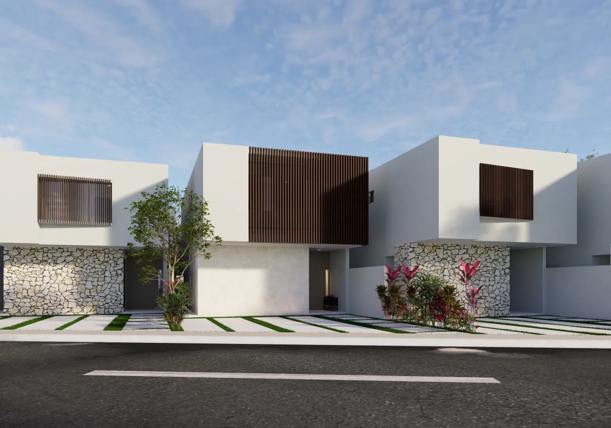 white and brown houses near body of water during daytime