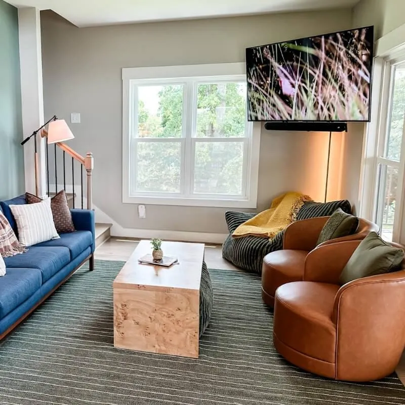 Cozy living room seating and TV College Football Rental