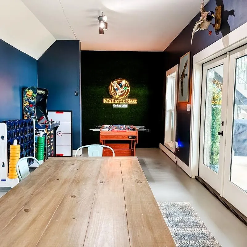 mallards nest game room turf accent neon logo vrbo rental alabama