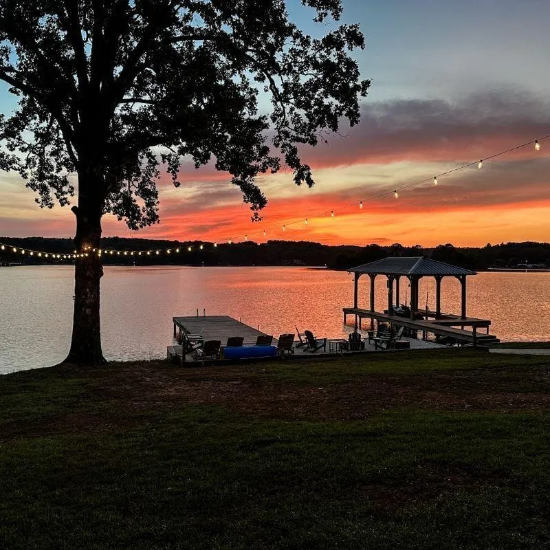 weekend group getaway lay lake Sunset over private dock Mallards Nest