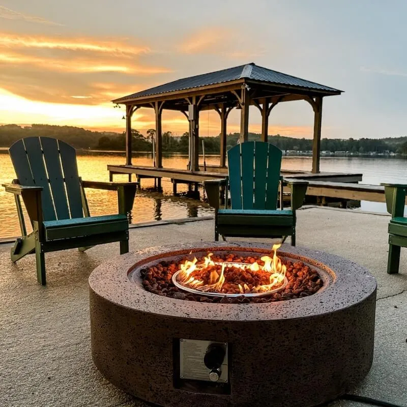 Sunset over dock and firepit Lay Lake wedding accomodation shelby county
