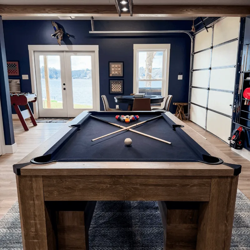Pool table in game room at Mallards Nest on Lay Lake with lake views and natural light