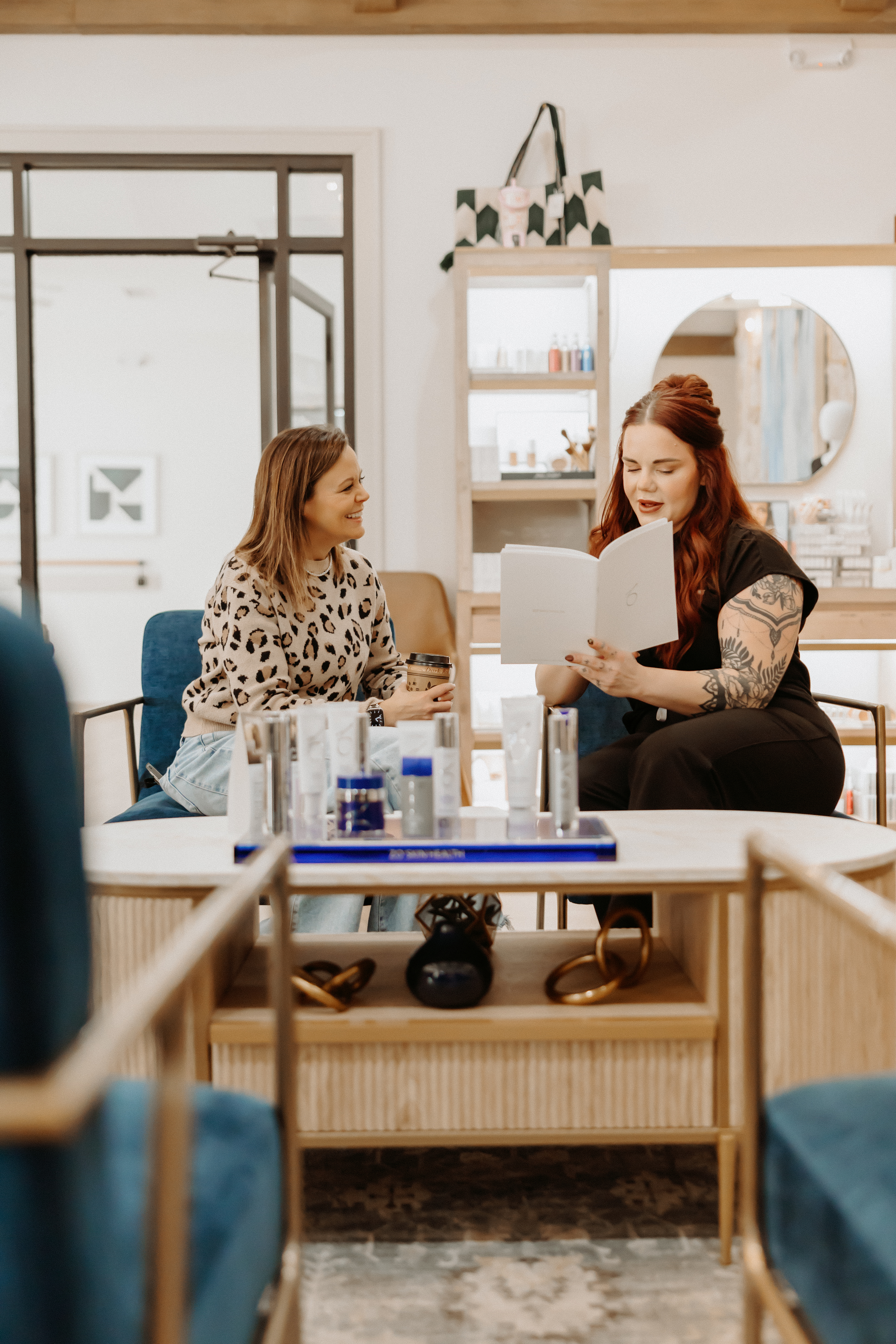 Client consultation at Hello Beautiful Medical Spa & Wellness Center in Big Spring, Texas, featuring personalized skincare and wellness guidance in a luxury spa setting.