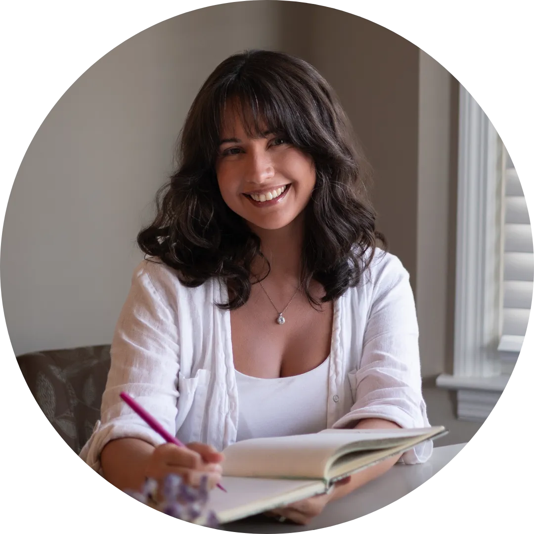 Victoria Gandolfo, founder of Victoria’s Educational Services and creator of the Friendship Confidence™ and Dating Confidence™ Programs, smiling at her desk in Staten Island.