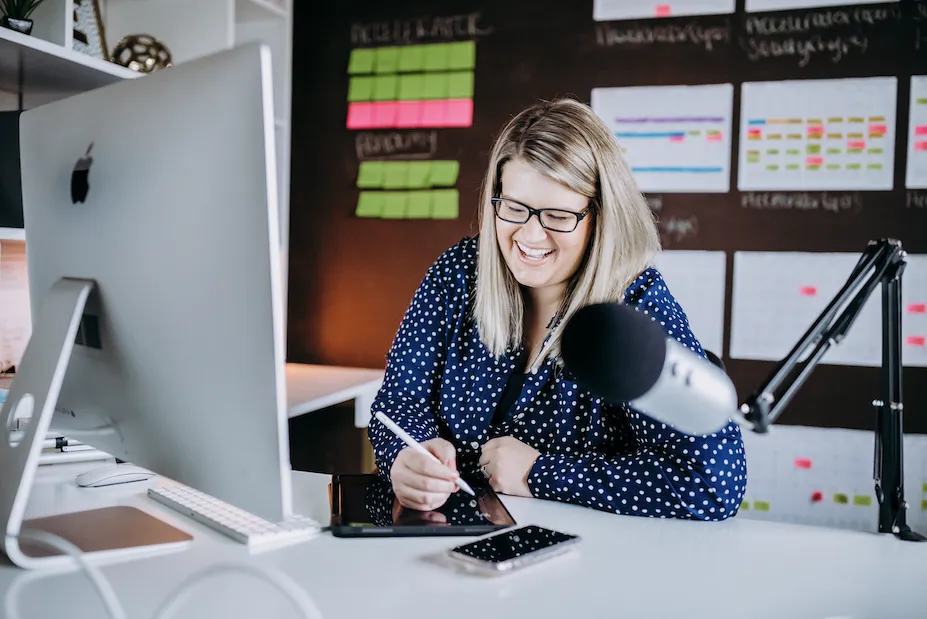 Photo of Steph Blake working in her office, where she creates strategies to help entrepreneurs run profitable businesses in less than 20 hours per week.