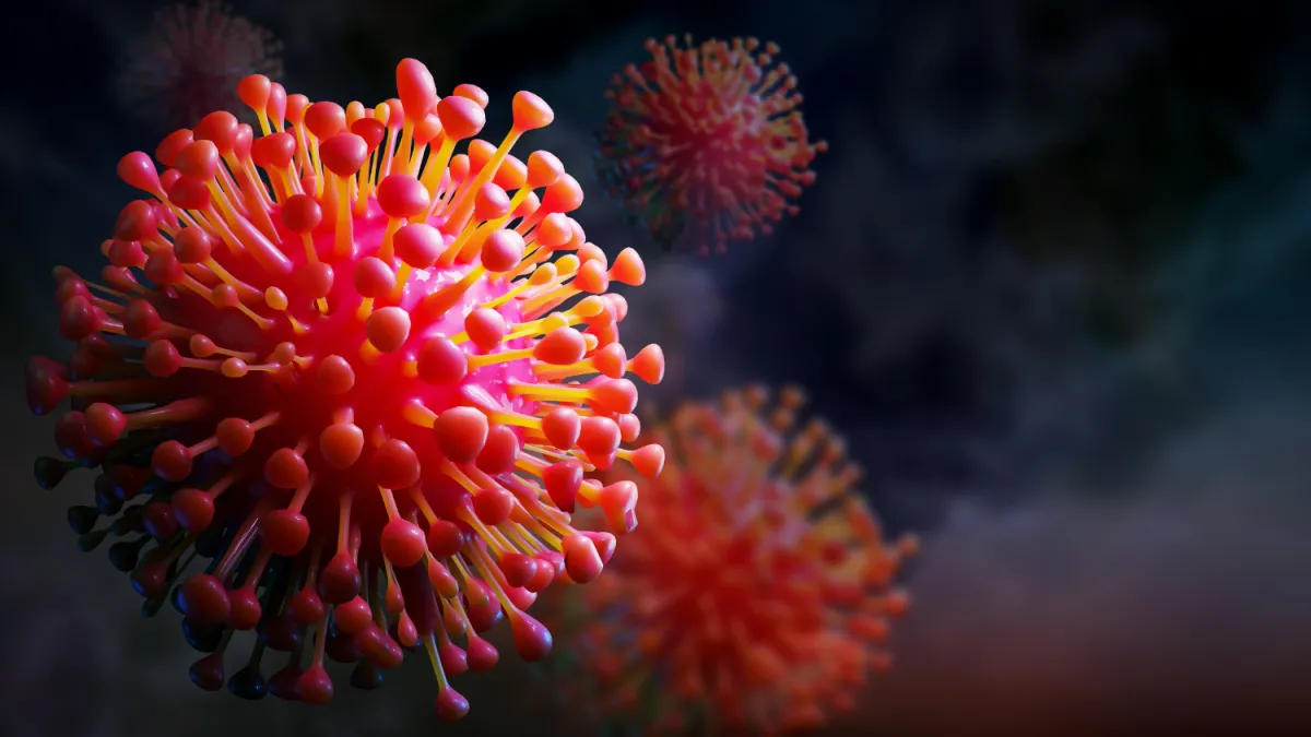 man holding white hair trimmer