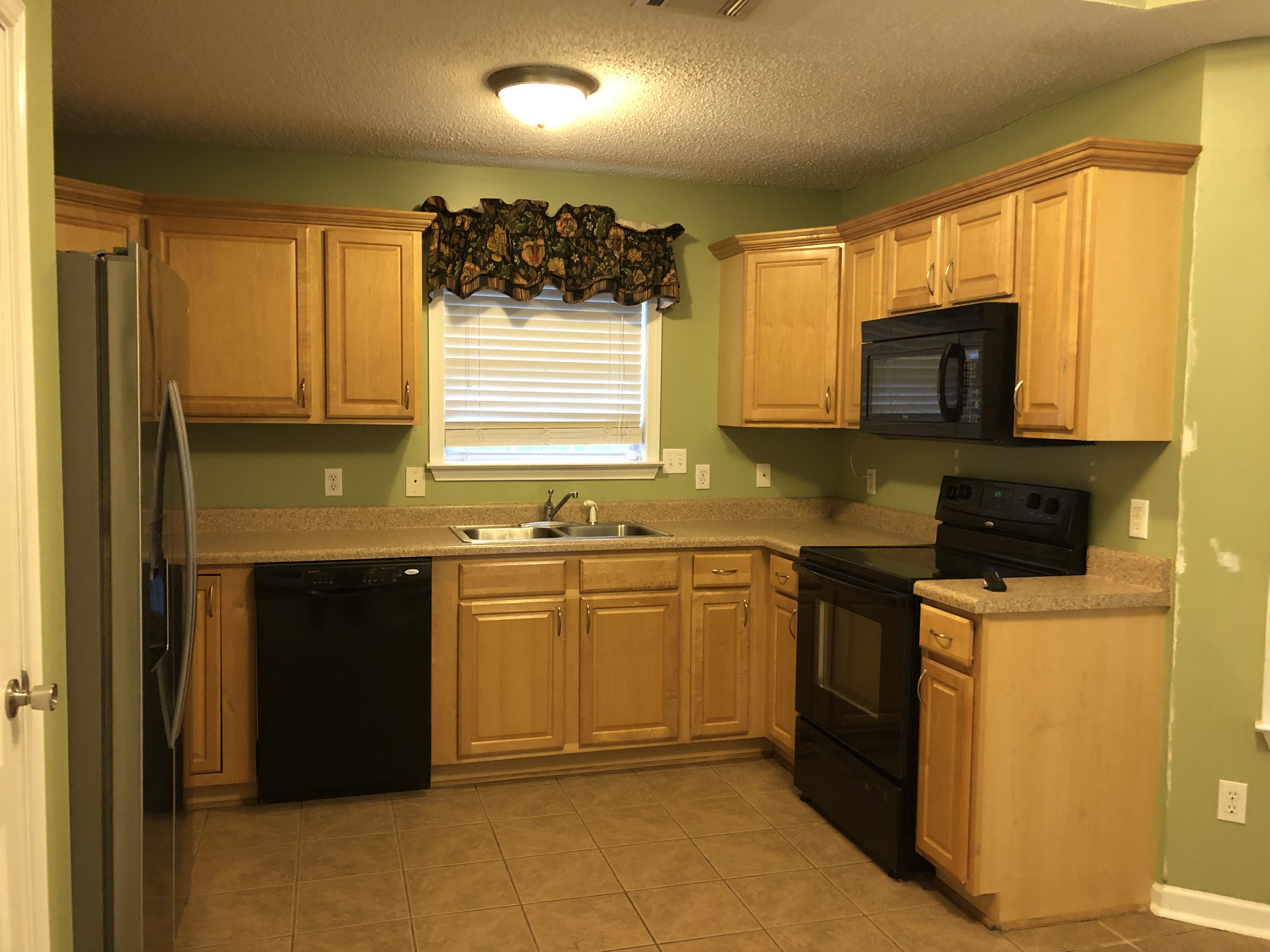 Sell my house as is in Bonaire GA. Outdated kitchen.