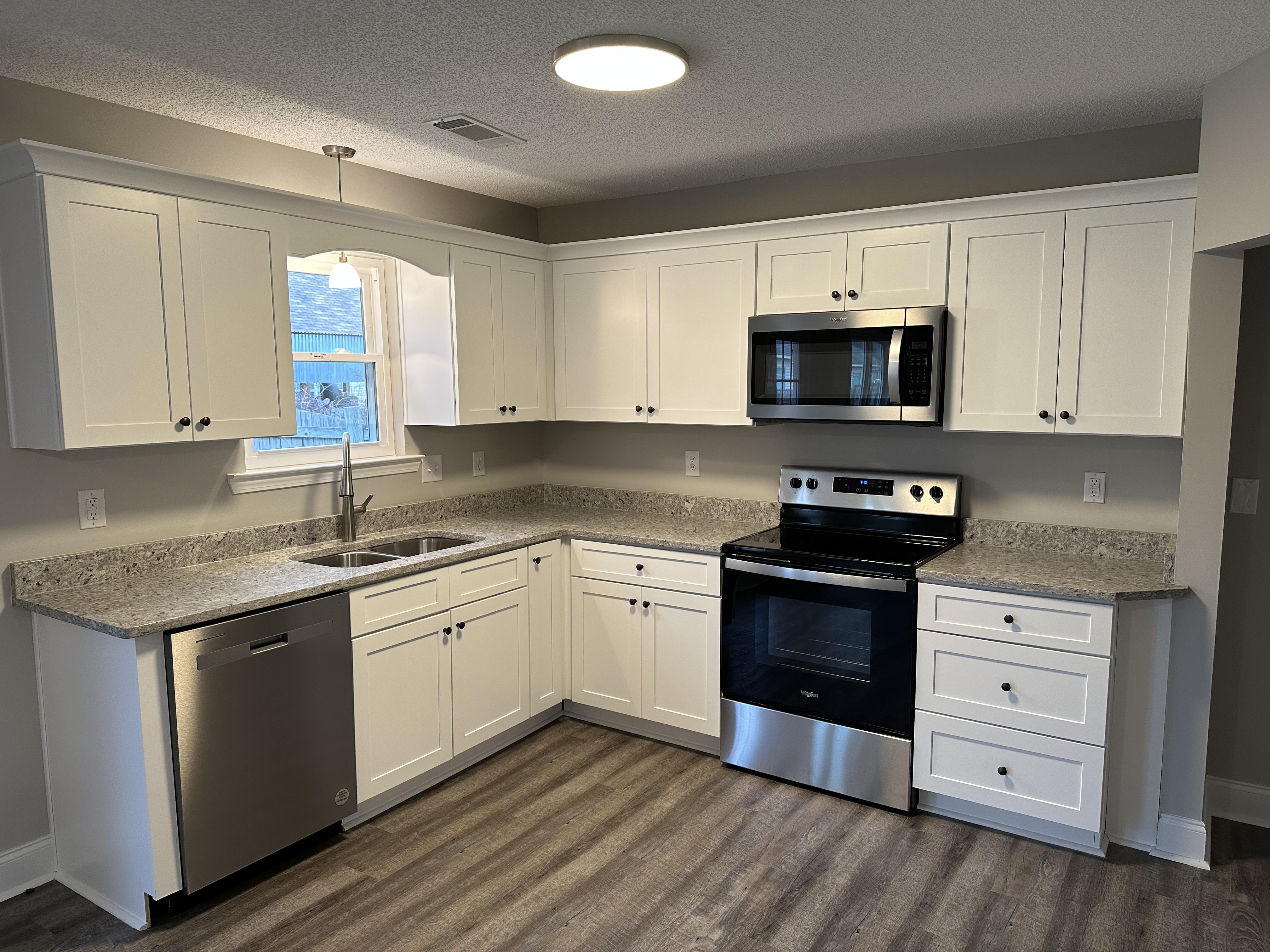 Inherited Vacant house with a renovated kitchen.JPG