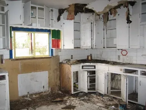 Damaged house - sell in as is condition