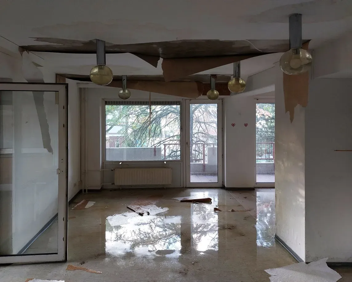 Water Damaged house with busted ceiling