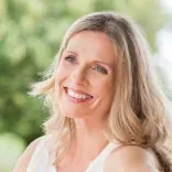 Woman feeling confident following a Quantum Regression and Integration Therapy session.