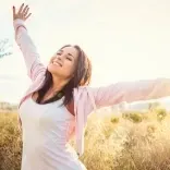 Woman feeling less tension and pain with the help of a Quantum Regression and Integration Therapy session.