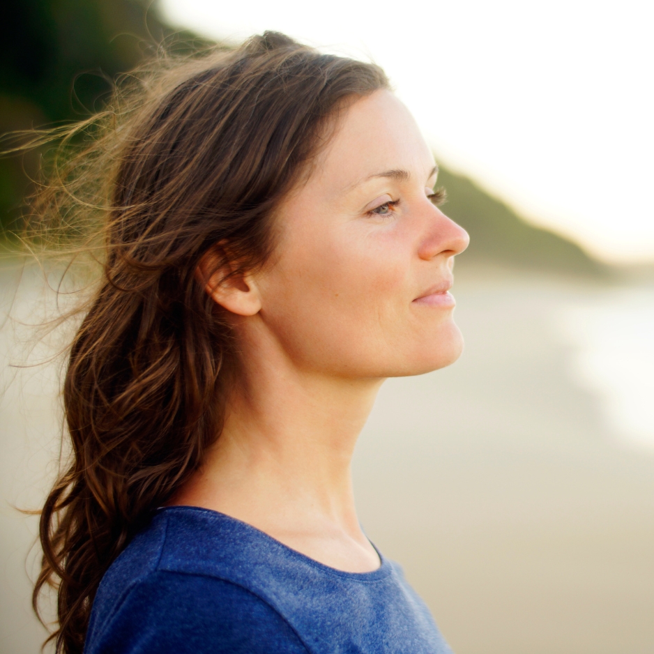 Woman releasing stress and deep emotional trauma with the help of Empowered Breast Cancer Journey Masterclass.