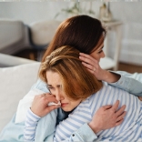 Woman releasing stress and deep emotional trauma with the help of Empowered Breast Cancer Journey Masterclass.