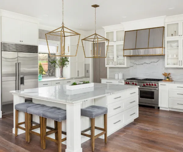 Austin Precision kitchen & Bath remodel with modern white cabinets and granite countertops by Austin Precision Kitchen & Bath Remodel