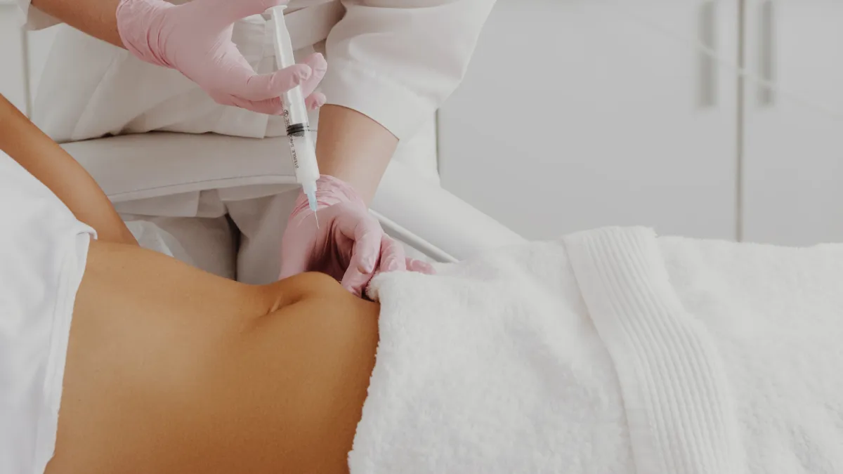 Lipolysis vs CoolSculpting: Compare how they work, results, downtime, and treatment areas for fat reduction.