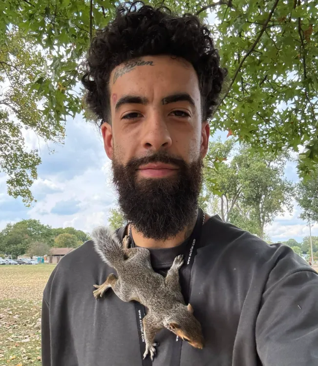 dog trainer with a squirrel