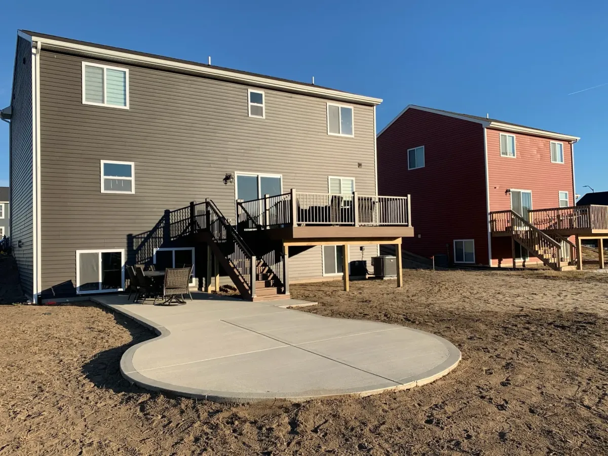 Residential deck with concrete patio