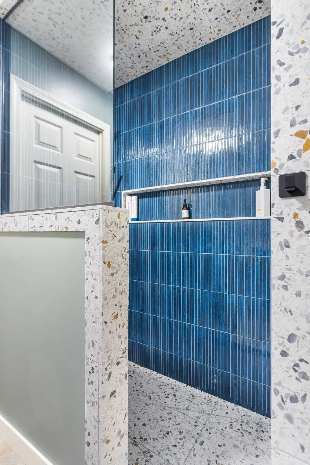 bathroom remodel with tiled shower