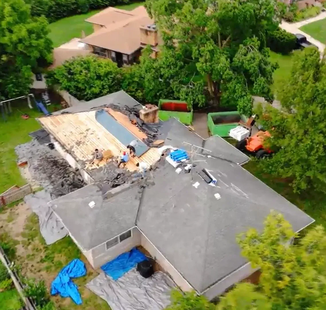removing damaged shingles from roof