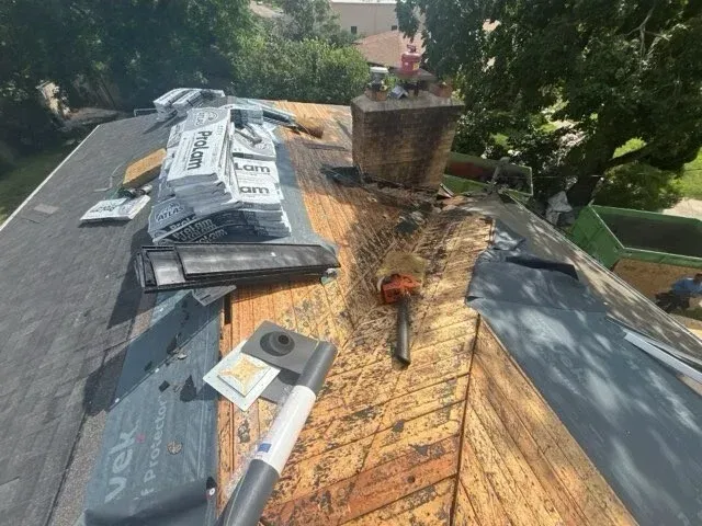 installing new roof decking and shingles