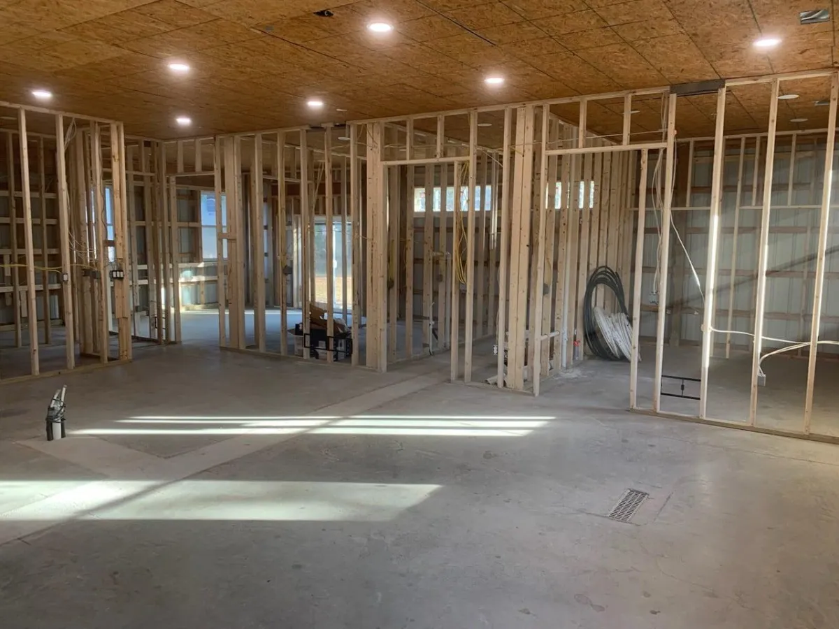 Framing and ceiling installation inside barn conversion