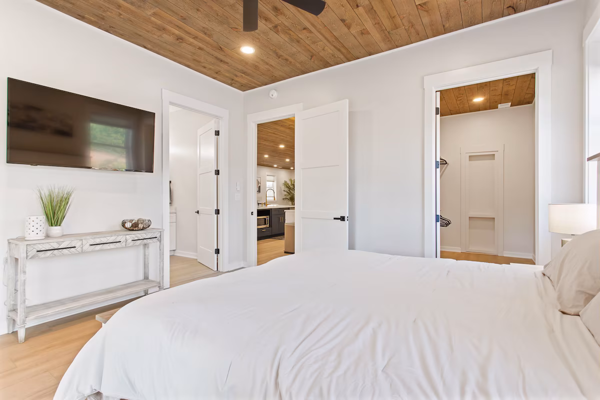 Elegant bedroom with modern furniture and lighting