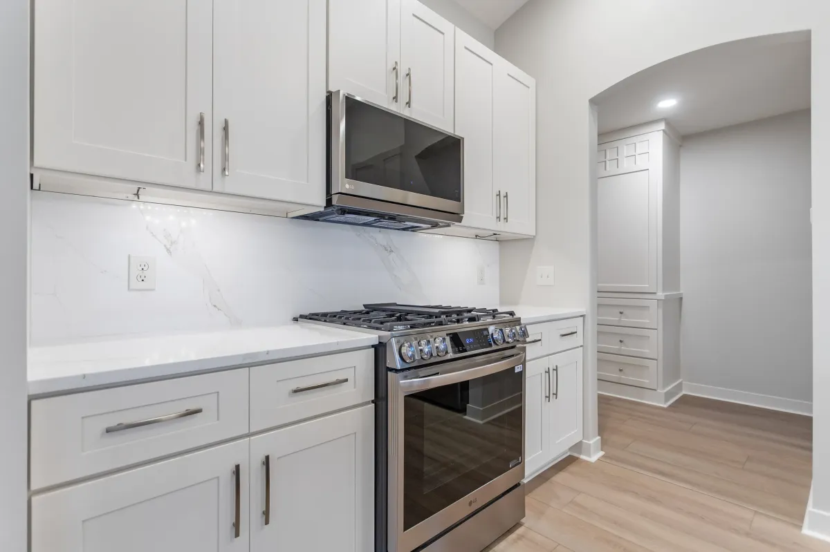 custom cabinets installed with new appliances