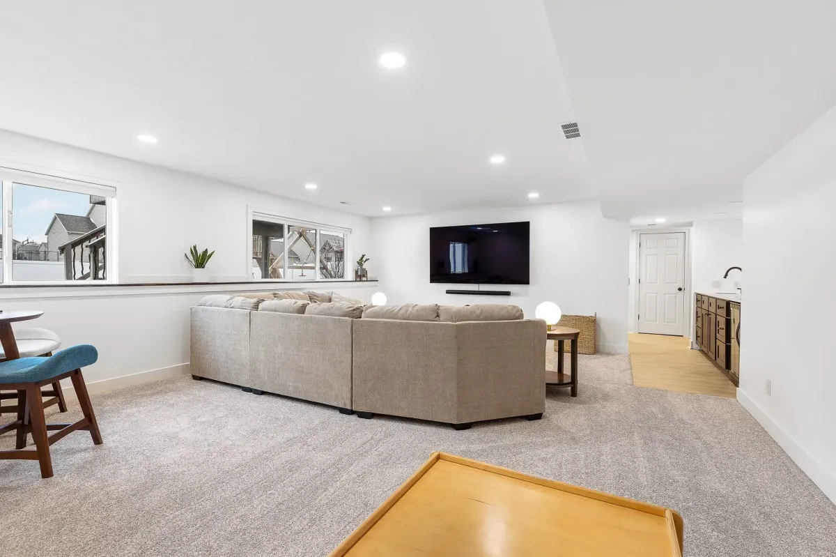 Finished basement remodel wide angle view completed by TPC Construction
