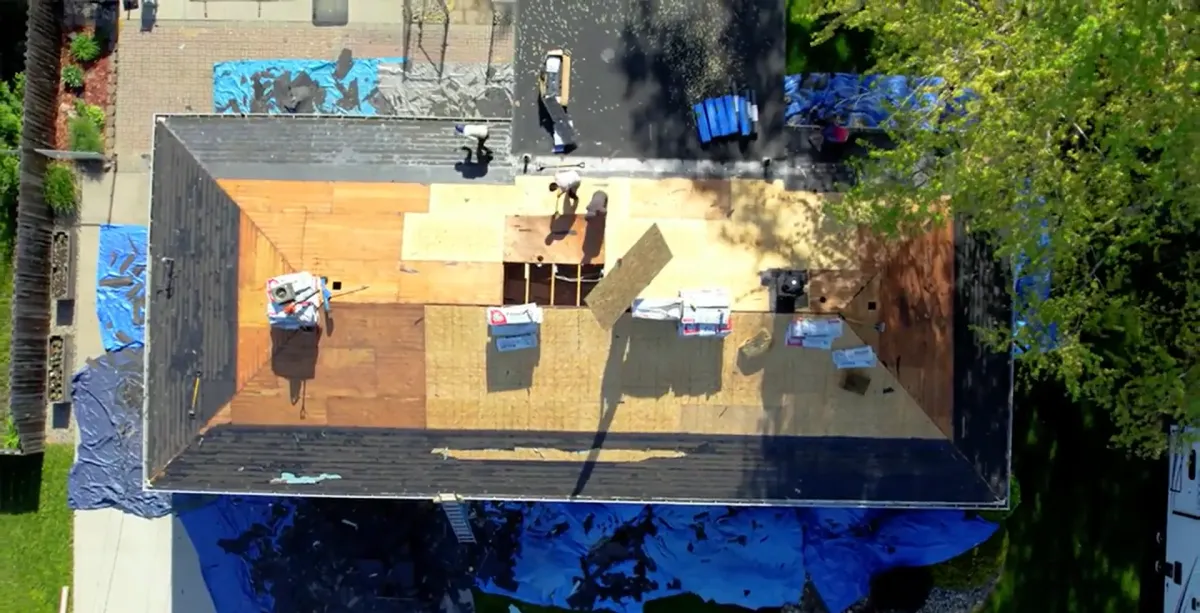 installing new roof decking and shingles