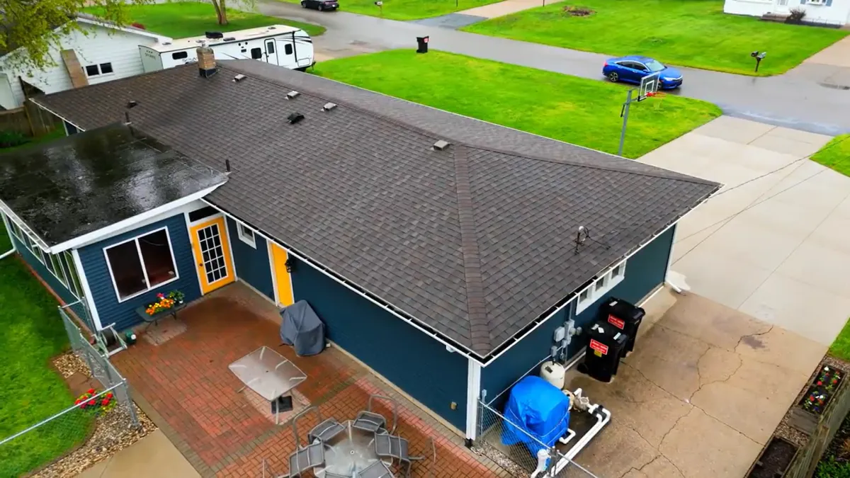 Back yard view of finished roof replacement completed by TPC Construction