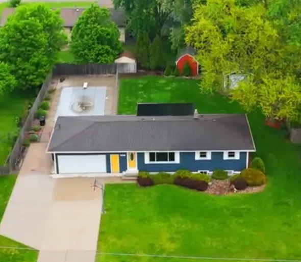 Drone picture showing finished roof replacement completed by TPC Construction in Jenison, MI