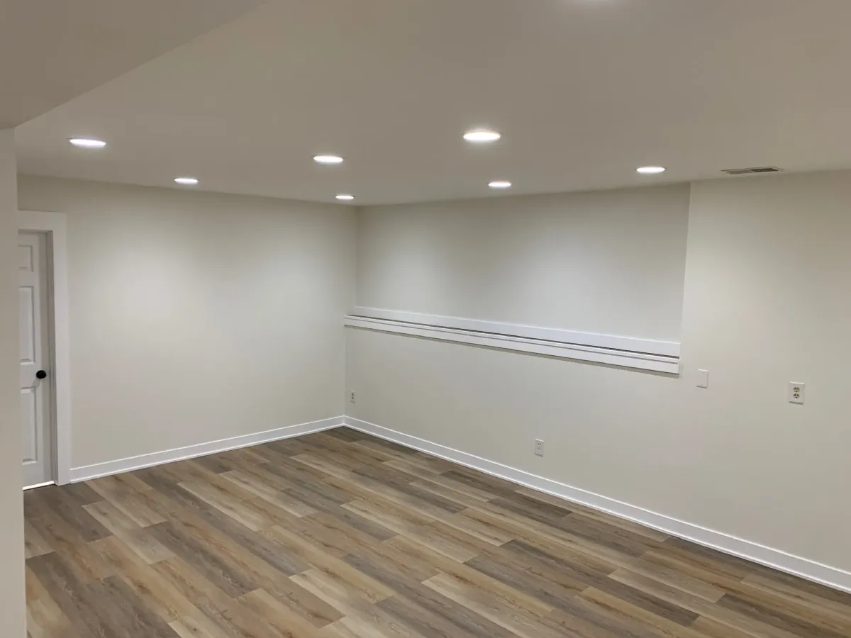 basement living room remodel with recessed lighting in grand rapids