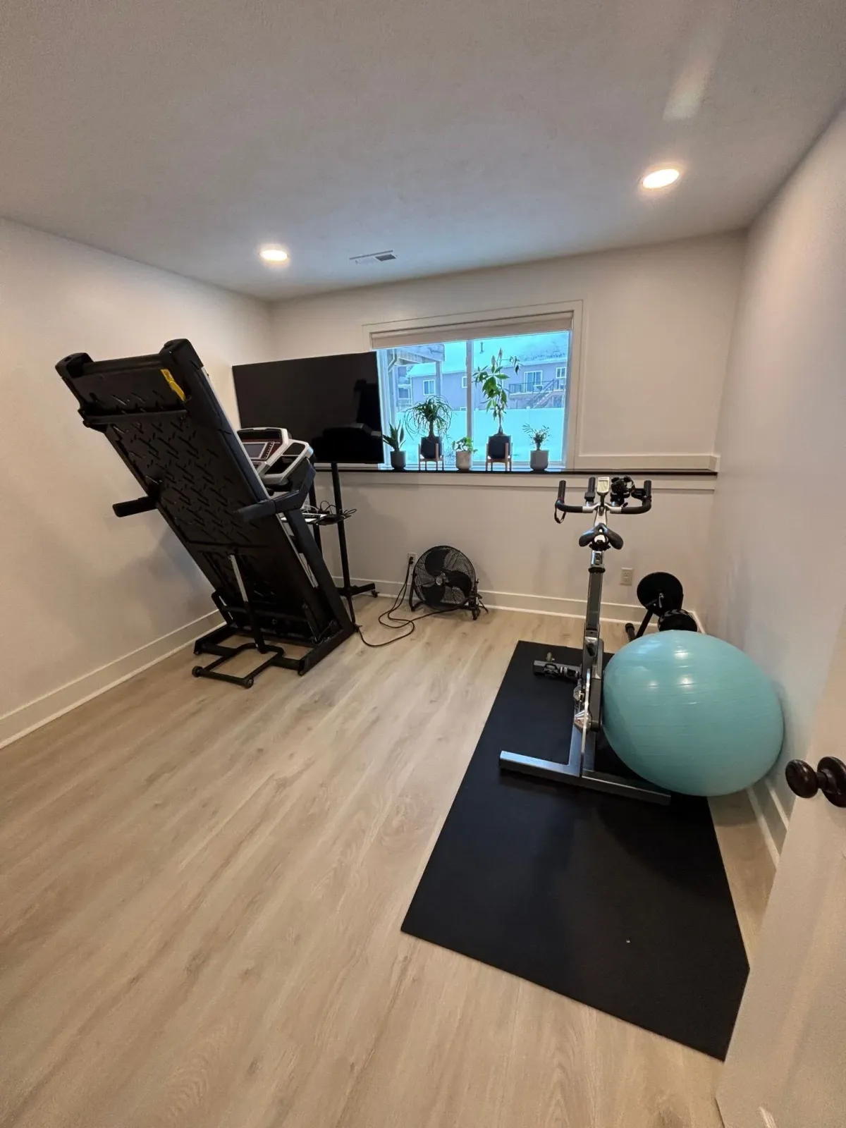 home gym room in remodeled basement