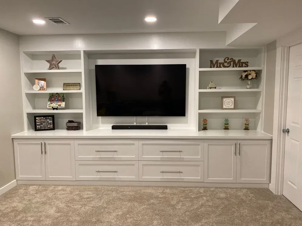 Custom cabinet entertainment center for basement remodel