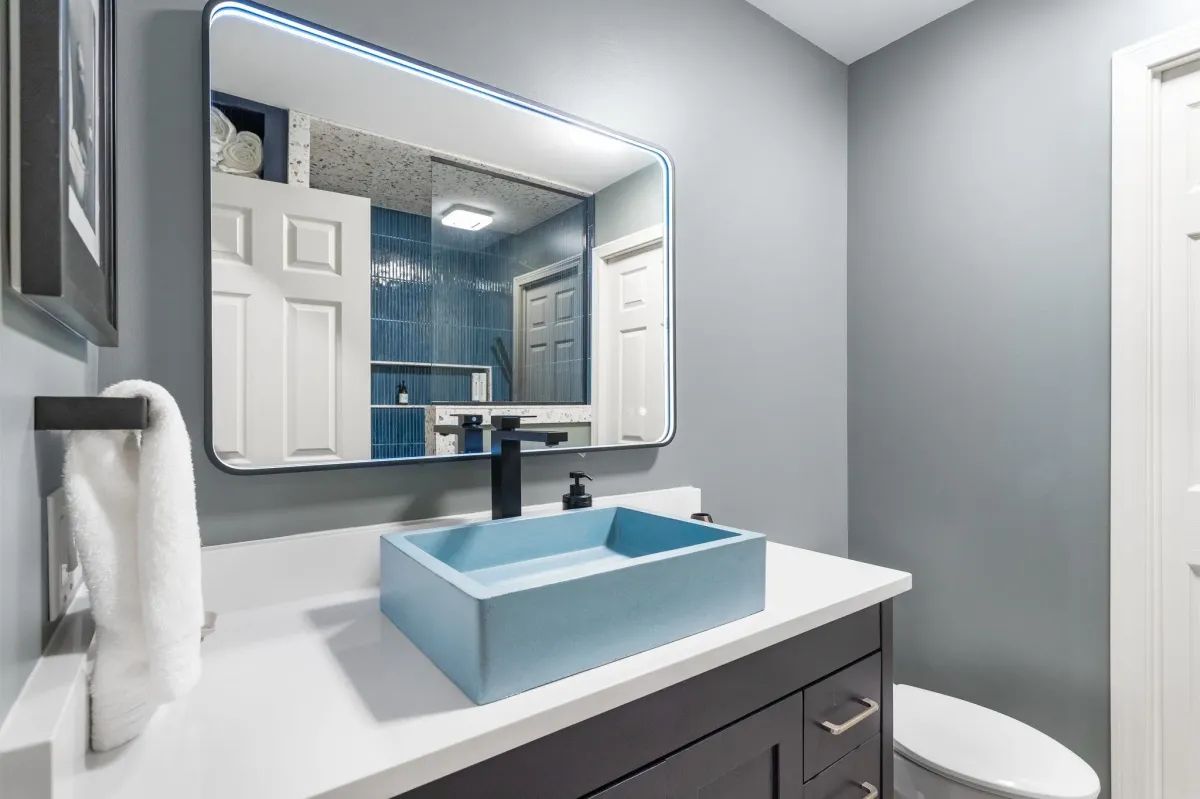 raised baby blue sink in remodeled grandville bathroom