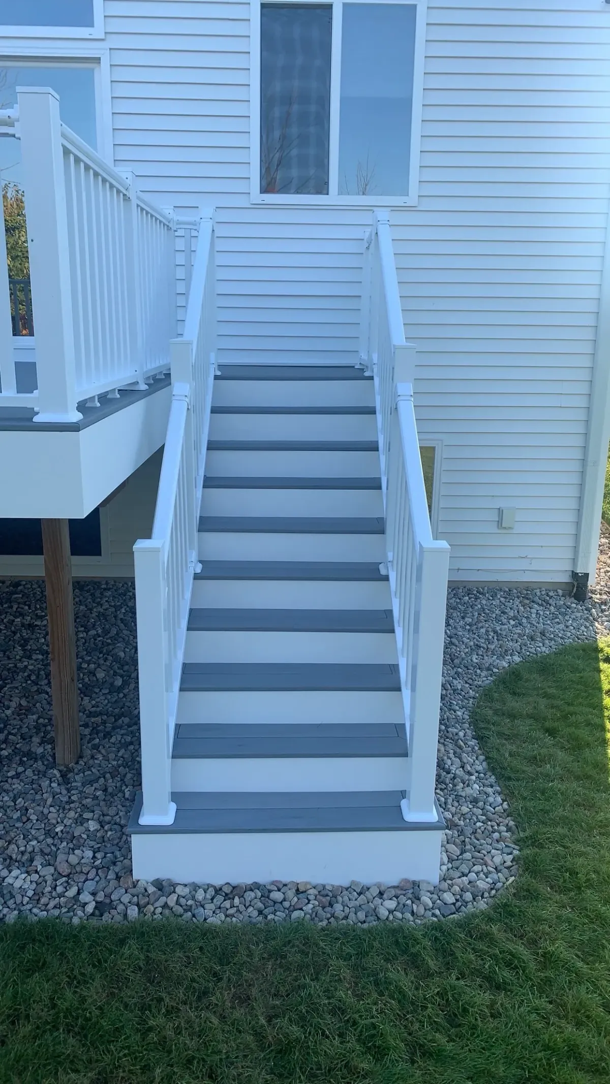 White deck stairs for family home in grand rapids, mi