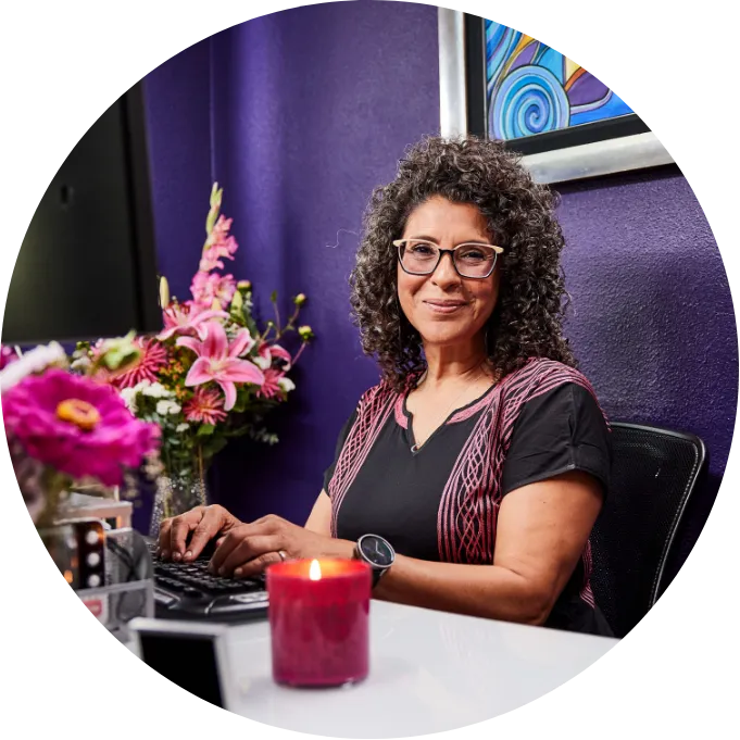 Nanci at her desk