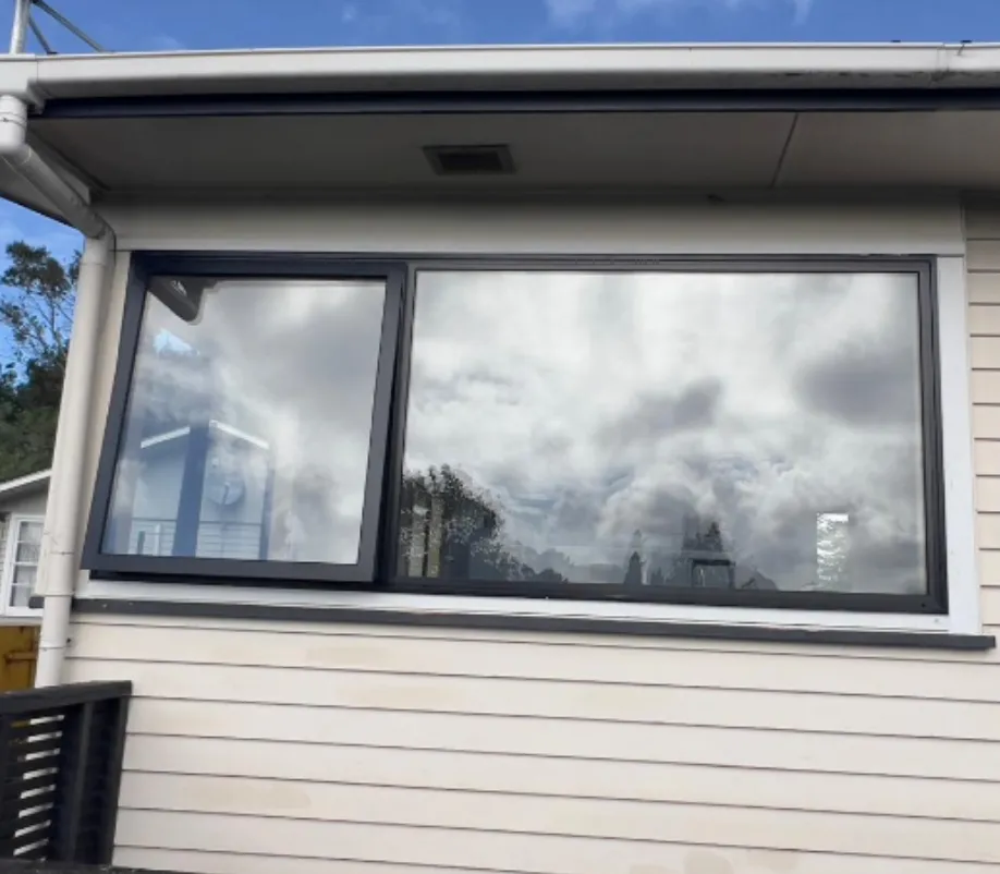 Wooden to aluminium double glazed window replacement Auckland