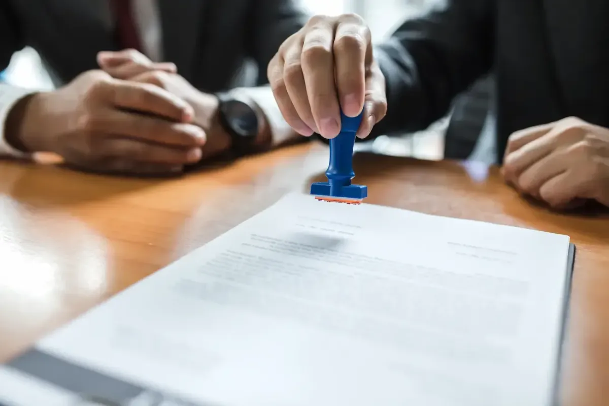 Florida notary stamping a signed document