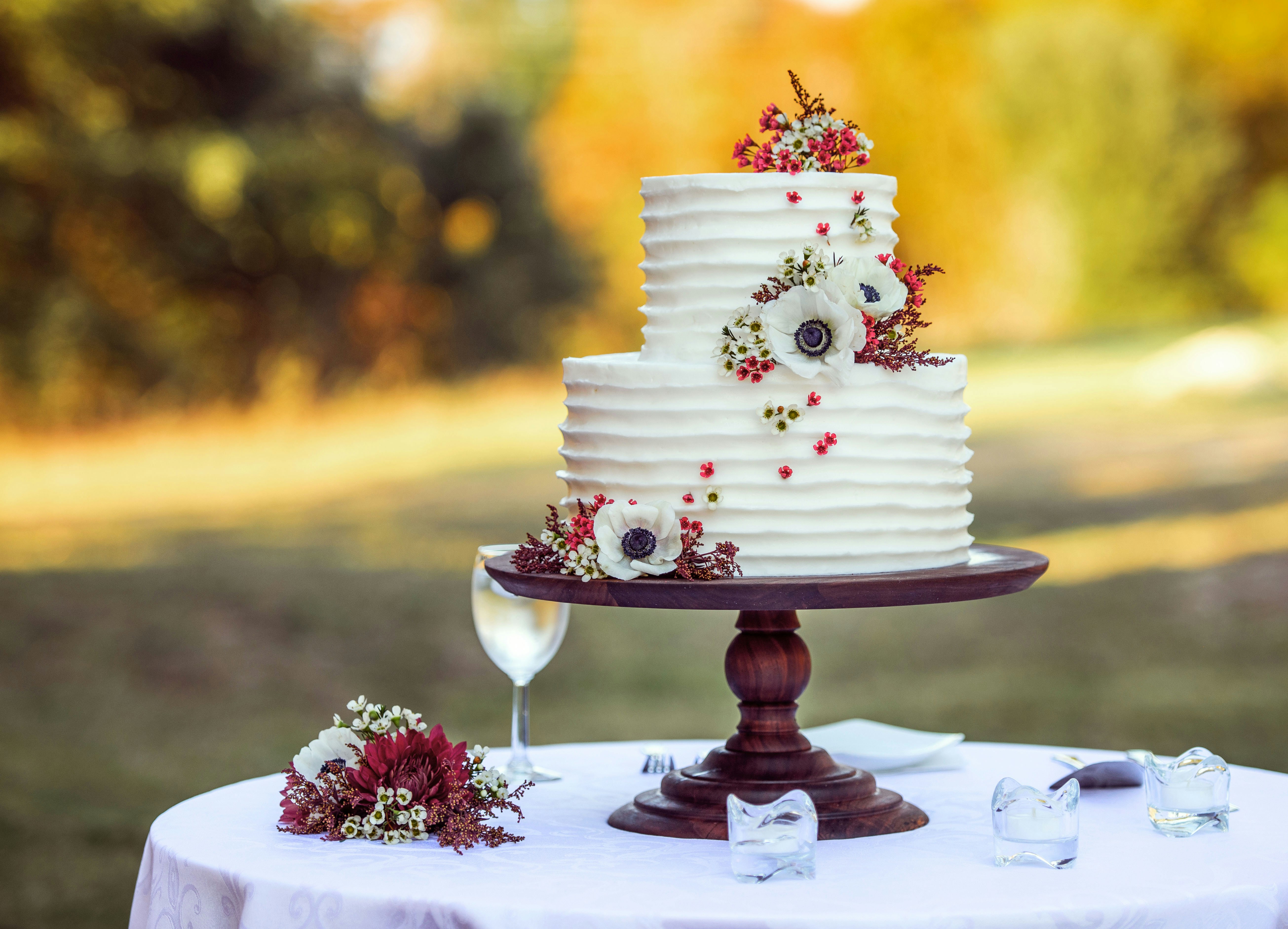 a three tiered cake sitting on top of a table