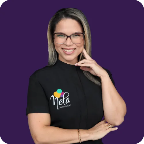 Daniela Duran – Founder of Nela Balloons & Art smiling in branded t-shirt
