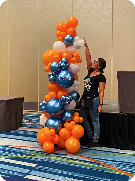 Halloween-themed grab-and-glow garland with pumpkin balloons – kids party